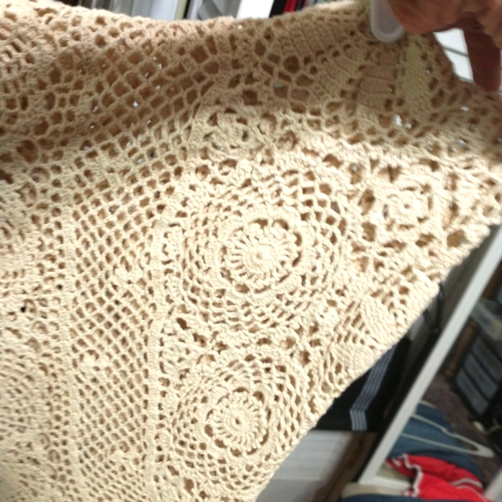 Vintage oval crocheted tablecloth